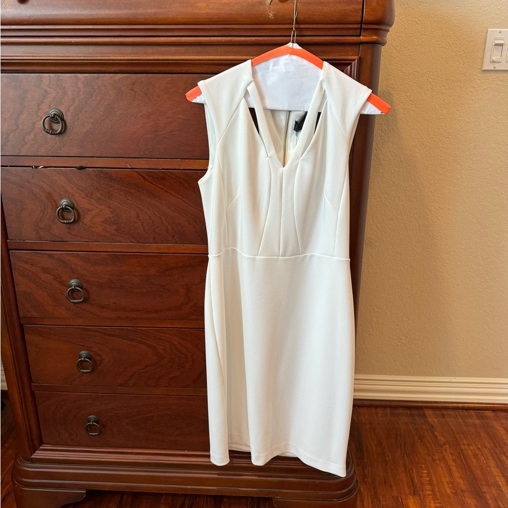 Alexia Admor white, V-neck dress with stylish cut-outs.  Size 8.